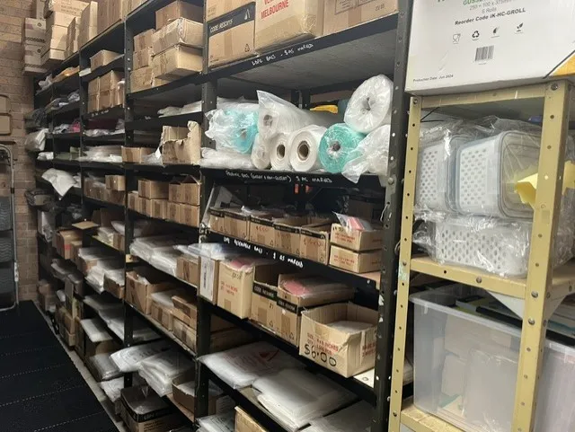 Shelving stocked with LDPE plastic bags and carry bags in Tuncurry