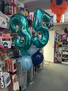 Teal number 35 foil balloons with a matching balloon bunch in store