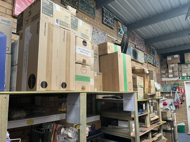 Packaging stock stacked on high shelving in the Tuncurry store